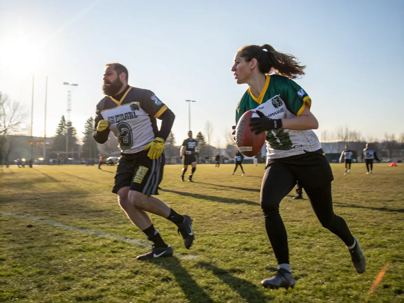 A dynamic image of adult players competing in a football league match, capturing the intensity and camaraderie of the game. Spectators are cheering from the sidelines, creating an exciting atmosphere.